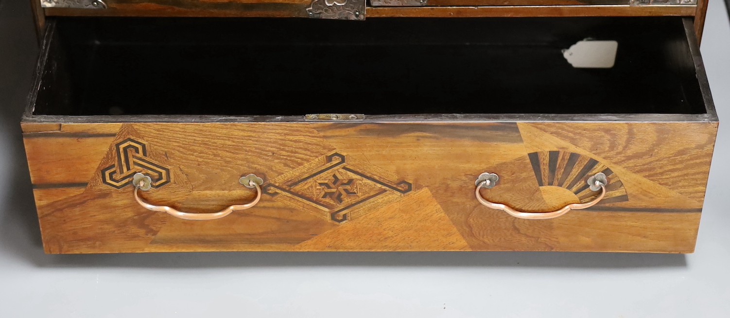 A 19th century Japanese Hakone parquetry table top chest, 55 cms wide x 46.5 cms high.